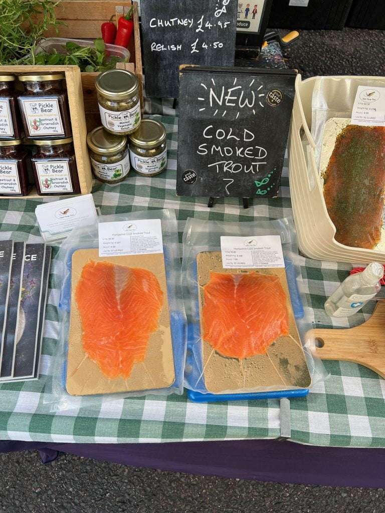smoked trout for sale at a farmers market 1