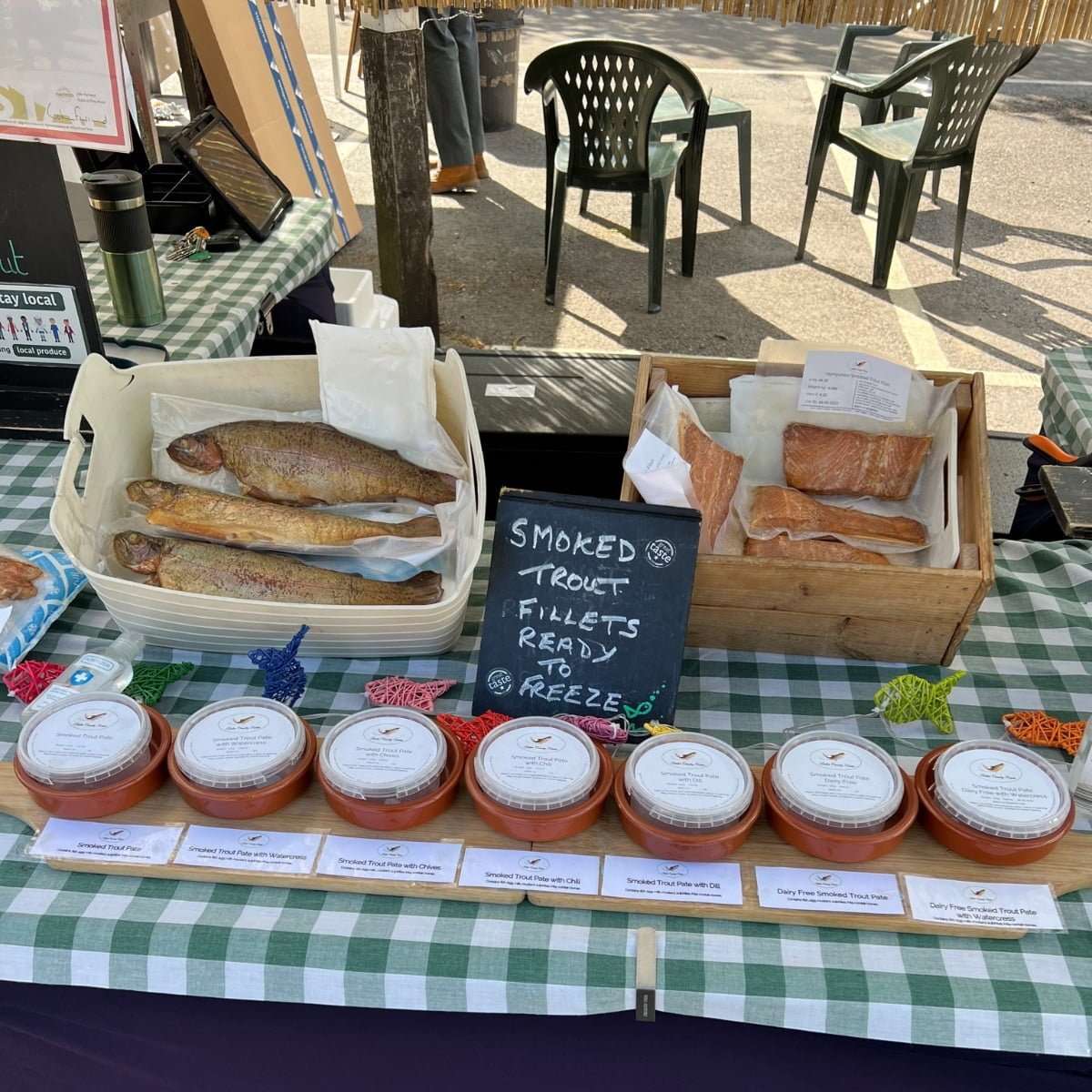 smoked trout for sale at a farmers market