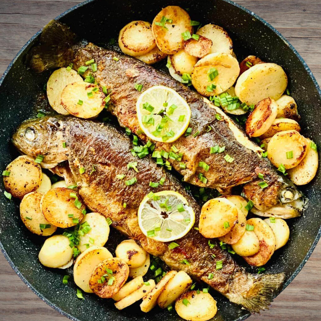 rainbow trout with potatoes and spring garlic